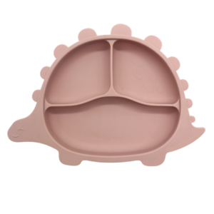 Poeder roze silicone dinobord met zuignap, ideaal voor baby's en peuters om zelfstandig te leren eten. Met vakjes om smaken apart te houden en een deksel voor eenvoudig opbergen.